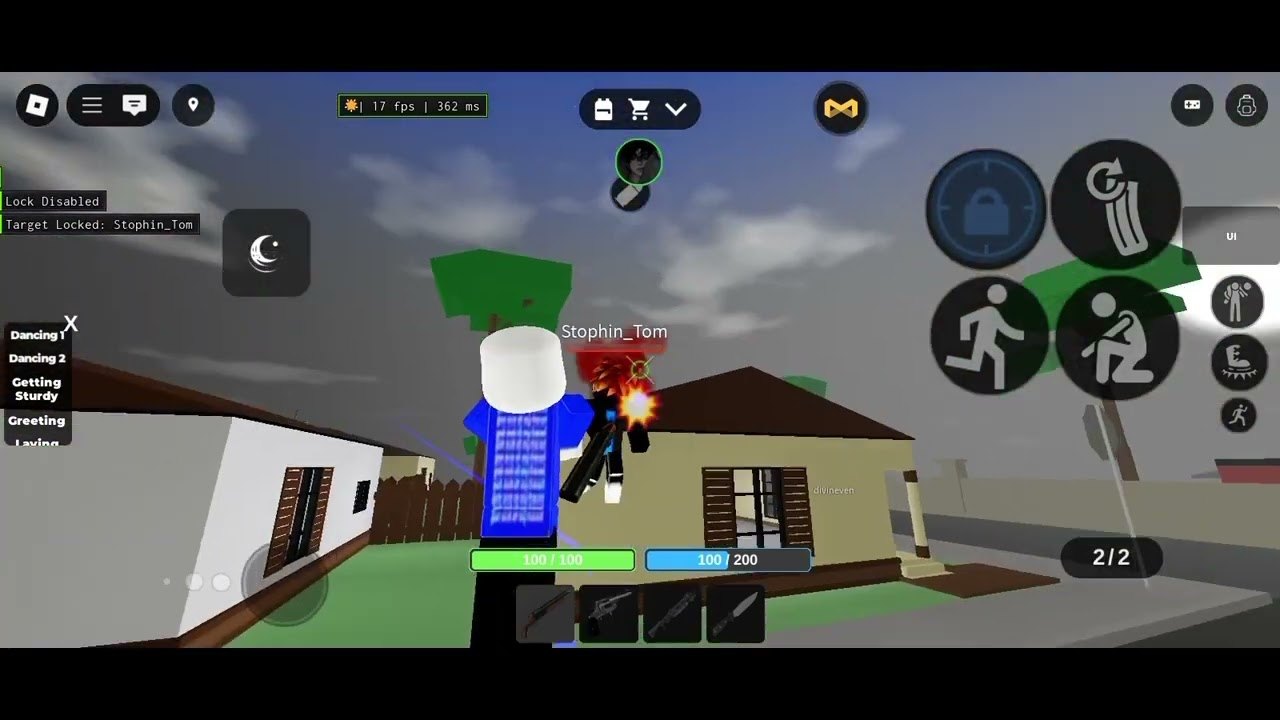 Dan FFA neighborhood fight with lock HUD, health bars, and mobile combat buttons